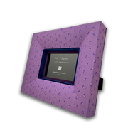 Handcrafted picture frame "Austrian Dirndl" covered in dusty pink dirndl-apron fabric with delicate floral pattern, dark blue velvet inlay and violet passepartout – handmade in Austria.